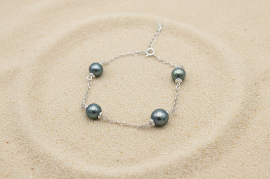 Silver bracelet with 3 Tahitian pearls in circles B/C