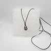 Collier en Coton ciré et Perle de Tahiti Cerclée C (A+)