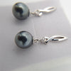 Boucles d'oreilles en Argent et 2 Perles de Tahiti Rondes C (A+)
