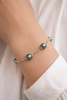 Silver bracelet with 3 Tahitian pearls in circles B/C