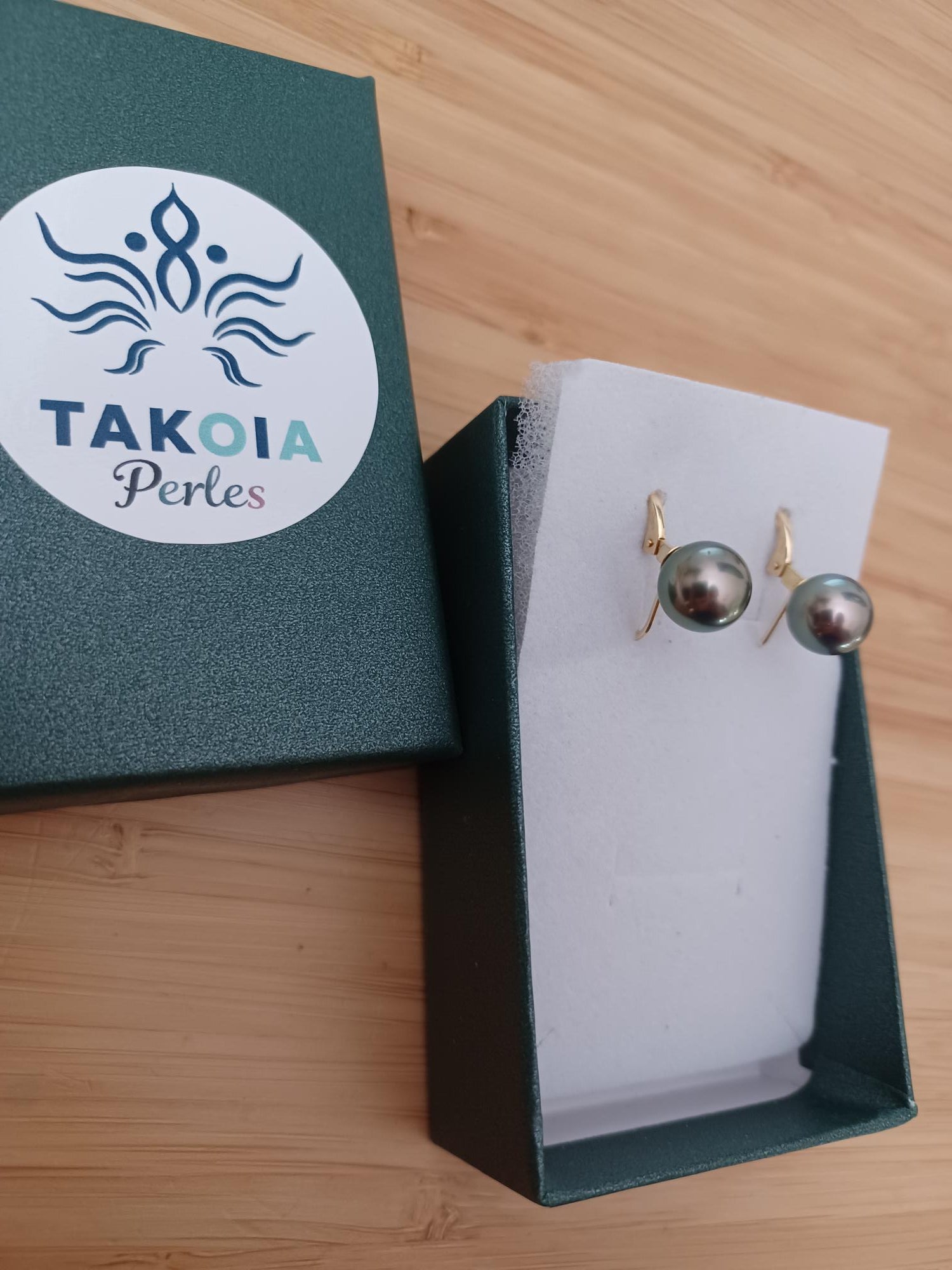 Boucle d'oreilles en OR et perle de tahiti