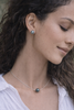 Boucle d'oreilles et perle de tahiti