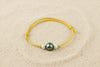 Bracelet enfant jaune avec perle de Tahiti