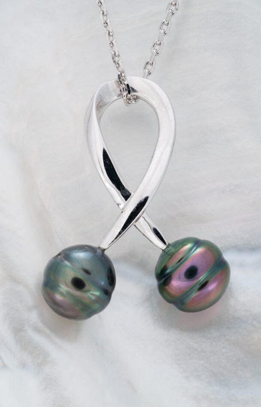 Pendentif en argent avec 2 perles de tahiti cerclées